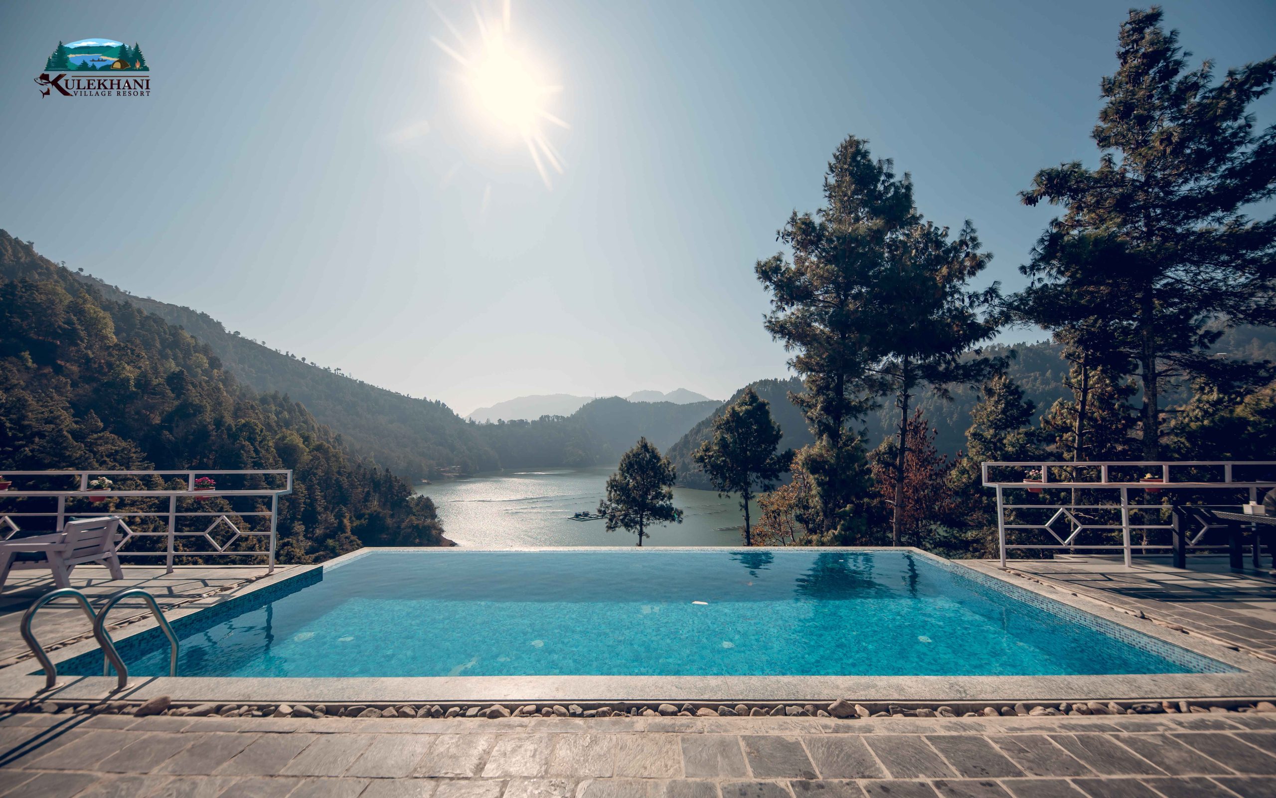 lake view with swimming pool at kulekhani village resort